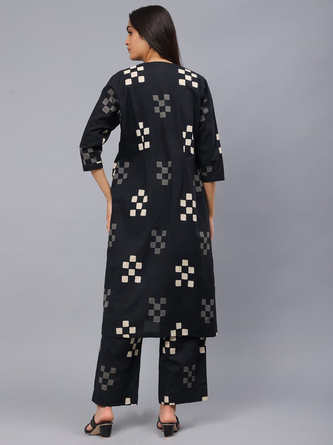 White Sleeveless Kurti with Black Printed Trouser with Pocket